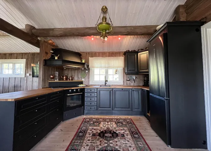 Welcoming With Fireplace & Modern Kitchen